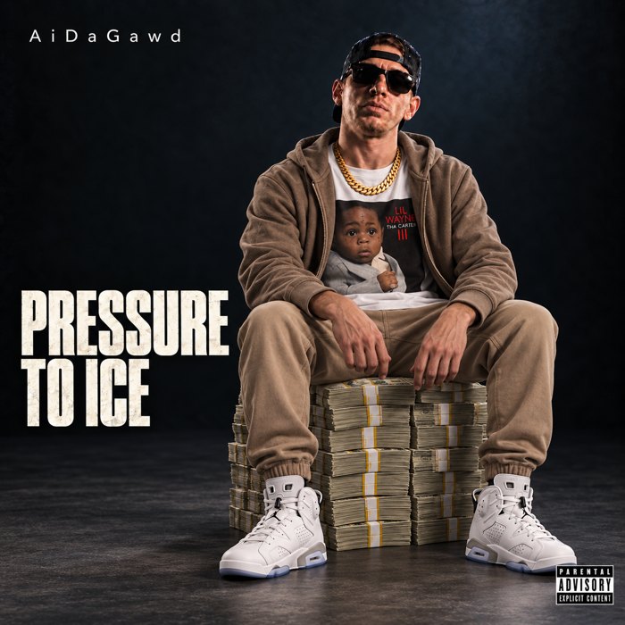 Artist seated on tall stacks of cash on a Pressure to Ice cover